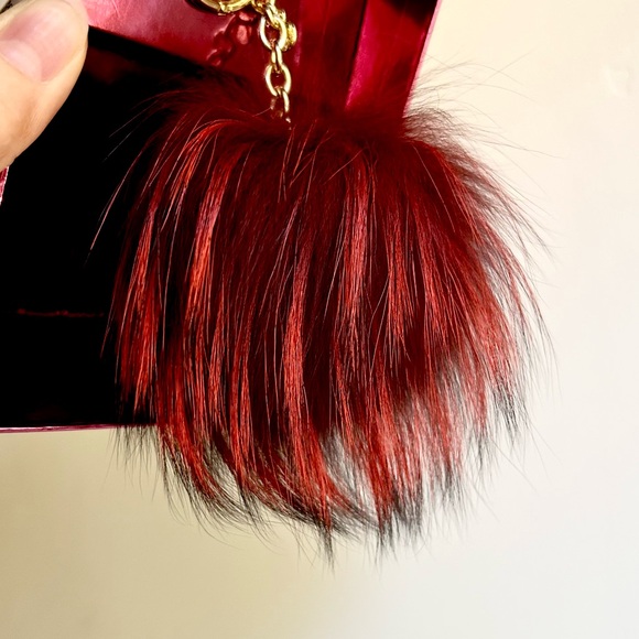 RARE Michael Kors Cherry Red Fox Fur Pompom Keychain Gold Medal - Picture 1 of 6